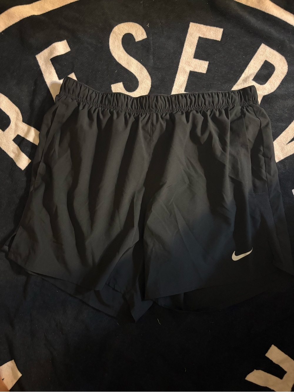 Nike Women’s Black Athletic Shorts with White Swoosh